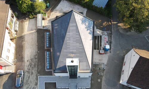 Referenz Kirche von Bettingen ausgestattet mit MATCH Slate PV-Modulen von Megasol Energie AG